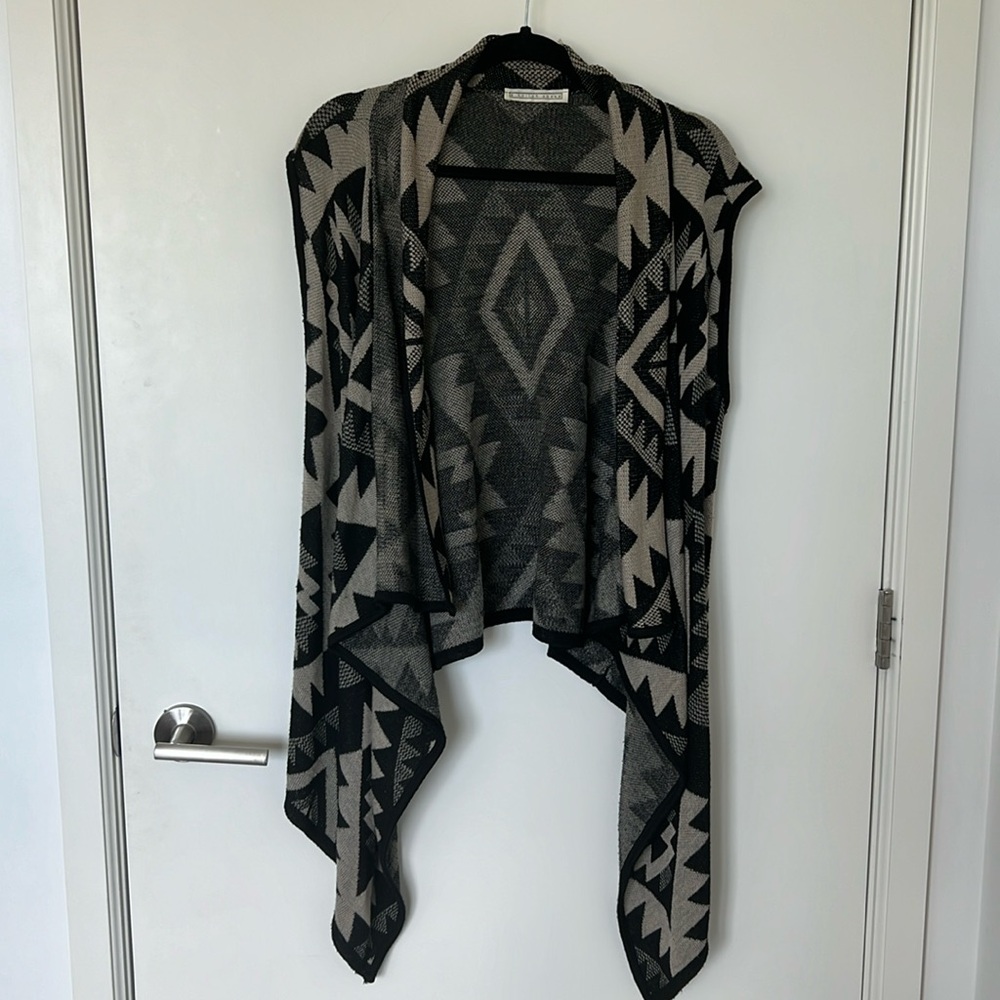 High low  Sweater vest by A knitch above